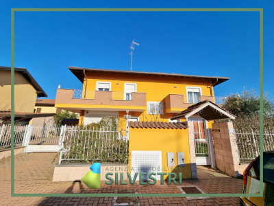 Immobiliare Silvestri, SAN PIETRO MOSEZZO:APPARTAMENTO CON GIARDINO IN VILLA BIFAMILIARE